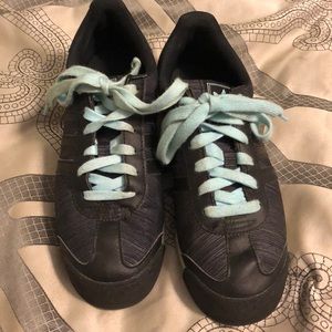 Adidas size 7 in woman’s shoes.